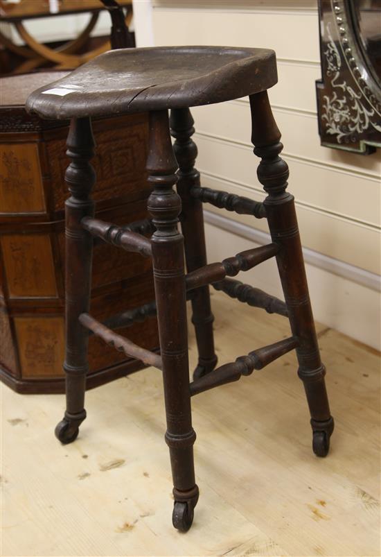 An oak stool H.65cm